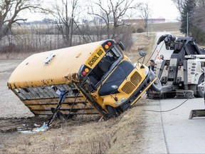 A school bus carrying 40 students crashed at a rural intersection in Oxford County shortly after 8 a.m. on Tuesday March 5, 2023. Several kids were taken to hospital. (Derek Ruttan/The London Free Press)