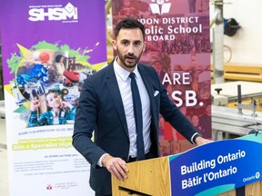 Education Minister Stephen Lecce announces funding for two new schools at Holy Cross Catholic Secondary School in Strathroy, Ontario on Wednesday March 27, 2024. (Derek Ruttan/The London Free Press)
