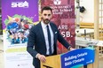Education Minister Stephen Lecce announces funding for two new schools at Holy Cross Catholic Secondary School in Strathroy, Ontario on Wednesday March 27, 2024. (Derek Ruttan/The London Free Press)