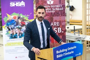 Education Minister Stephen Lecce announces funding for two new schools at Holy Cross Catholic Secondary School in Strathroy, Ontario on Wednesday March 27, 2024. (Derek Ruttan/The London Free Press)