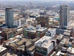Ayerswood Developments' 25-storey tower at 195 Dundas St., left, and York's Aqui highrise at 131 King St. are set to permanently alter downtown London's skyline.  (Mike Hensen/The London Free Press)