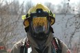 Owen Sound firefighter Mark Young wearing the Fusion Vision System thermal imaging camera which was tested Thursday, March 28, 2024 in Owen Sound, Ont. (Scott Dunn/The Sun Times/Postmedia Network)