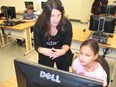 Canada Learning Code’s chief executive Melissa Sariffodeen is seen here in Cornwall, teaching students about making websites, on Friday, Oct. 23, 2015. (Postmedia Network file photo)