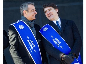Prime Minister Justin Trudeau, right, and Greek Prime Minister Kyriakos Mitsotakis