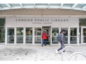 Patrons use the Dundas Street entrance to the London Public Library's downtown branch on Wednesday, Dec. 20, 2023. (Derek Ruttan/The London Free Press)