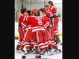 The Medway Cowboys celebrate after beating the Mother Teresa Spartans 4-0 in the WOSSAA boys hockey championship game at Nichols arena in London on Tuesday March 5, 2024. Mike Hensen/The London Free Press