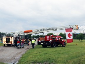 Whitecourt Fire Department members exhibited Tower 1 at Festival Park in 2022. The use of Tower 1 in Woodlands County became a controversy in early 2024. County council decided on March 13 that industrial ratepayers in Woodlands may establish third-party agreements to access the service.