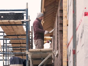 A worker was busy at a construction site of a new single-family home in Ontario; Mayerthorpe is exploring how to increase housing development. Mayerthorpe council recently adopted an Enabling Housing Choice project report, created with the Rural Development Network and funded by the Alberta Real Estate Foundation.