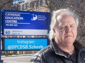 Teacher James Murphy, out front of the Dufferin Peel Catholic School Board in Mississauga, on Feb. 20, 2024. (Peter Thompson, Postmedia News)