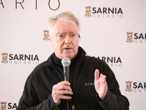 Sarnia Mayor Mike Bradley speaks at city hall March 13, 2024, as Sarnia receives $400,000 through the provincial Building Faster Fund.
