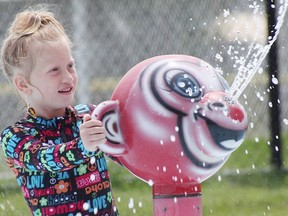 Viiolet Williams, 6, at the Norma Cox Splashpad in Tecumseh Park with her family May 22, 2023 in Sarnia.