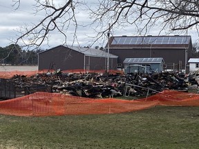 A pile of rubble is all that remains following a house fire on Highway 6 near Port Dover on Monday afternoon. Several pets perished in the blaze. SIMCOE REFORMER