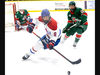 Matthew Souliere of the Strathroy Rockets tries to control a rolling puck in front Josh Cornfield (12) and Brandon Abbot of the St. Mary Lincolns during their GOJHL playoff game at the West Middlesex Memorial Arena in Strathroy on Tuesday March 26, 2024. Derek Ruttan/The London Free Press