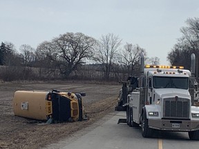 A school bus carrying 40 students crashed at a rural intersection in Oxford County shortly after 8 am on Tuesday March 5, 2023. Several kids were taken to hospital.  (Dale Carruthers/The London Free Press)