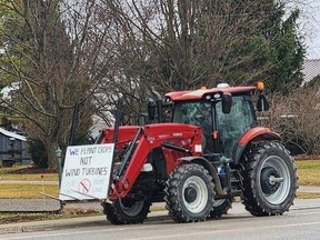 An East Zorra-Tavistock farmer drives a tractor with a clear message for members of council. (Lee Griffi/Local Journalism Initiative Reporter)