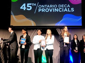 St. Mary's High School students Jiya Kukreja (left, light blazer) and Islay Graham (right, light blazer) have qualified for the DECA International Career Development Conference in California to compete against some of the brightest young business minds in the world in April. Photo supplied