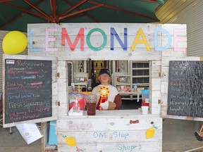 Melah Samson-Mobey, owner of Missy Moos's Lemonade, received the ribbon for best lemonade stand during Lemonade Day in 2023