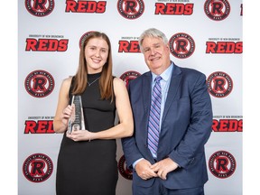 UNB Female Athlete of the Year Jayda Veinot with UNB President and Vice-Chancellor, Dr. Paul Mazerolle. (male athlete of the Year Austen Keating was unable to attend Thursday's REDS Awards).