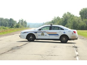 An RCMP cruiser blocks a road near Petitcodiac on July 20, 2020.