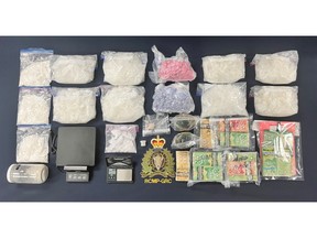 Drugs and cash seized by police during a New Brunswick drug investigation in June 2023.