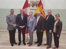 Education Minister Bill Hogan, Portland-Simonds MLA Trevor Holder, Anglophone South School District superintendent Derek O'Brien, Saint John deputy mayor John MacKenzie, Saint John East MLA Glen Savoie and Saint John Mayor Donna Reardon are seen Friday as the provincial government announced $12 million in funding as part of a community hub at the new north end school.