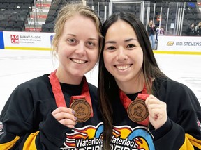 Lydia Duncan and Meghan Hanson-Fong, of Waterloo Wildfire of the NRL, show off their bronze medals as the Canadian championships