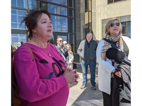 Lise Lamoureux speaks to reporters on April 22.
