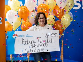 Kim Campbell of Fredericton won $675,000 from the Atlantic Lottery Corporation's Set for Life Scratch 'N Win contest on a ticket she bought while en route to work recently.