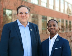 Michael Bellmore, left, chair of the board of trustees for the Sudbury Catholic District School Board, poses for a photo with David Madiba Akero, the board's new student trustee.
