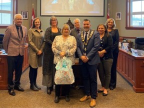 Rounds poses with Goderich council in the council chambers.
