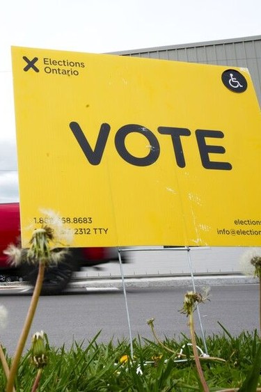 A vote sign is displayed outside a polling station during advanced voting in the Ontario provincial election in Carleton Place, Ont., on Tuesday, May 24, 2022. (THE CANADIAN PRESS/Sean Kilpatrick)