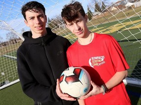 Soccer players Timothy Nassiokas, left, and Theo Tavabis of Sarnia, Ont., have been invited to train in Greece at the prestigious Olympiacos FC Academy in April 2024. Mark Malone/Chatham Daily News/Postmedia Network