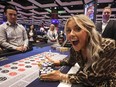 Canadian country star Lindsay Ell wins $100,000 betting on black on Tuesday, June, 20, 2023, at the roulette table at the opening of the Great Canadian Casino Resort Toronto. The winnings went toward the LGBT Youthline.