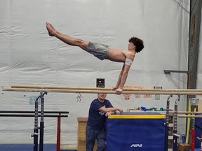 Gymnast on barrel bars