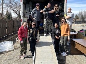 Volunteers help out at HUFS Sherwood Park furniture drive.