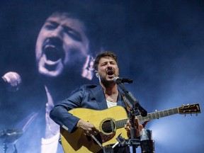Marcus Mumford performs with Mumford and Sons during the opening night of Rock The Park in Harris Park in London on Wednesday July 12, 2023. Derek Ruttan/ The London Free Press/Postmedia Network
