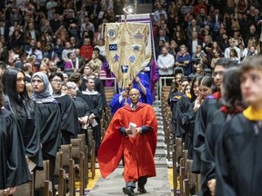 A processional of faculty members marches toward the stage to begin Western University’s 322nd convocation at Alumni Hall in London on Wednesday October 18, 2023. (Derek Ruttan/The London Free Press)