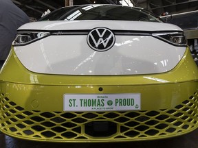 A Volkswagen bearing a license plate reading St. Thomas Proud is shown as Prime Minister Justin Trudeau and others officially unveiled VW's electric-vehicle battery plant.  Photo taken in St. Thomas on Friday April 21, 2023. (Mike Hensen/The London Free Press)