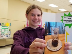 Stella Gowan, 12, of Kincardine found putting cola into compost helps it decay faster, a science fair project she presented Wednesday, April 10, 2024 in Owen Sound, Ont. (Scott Dunn/The Sun Times/Postmedia Network)
