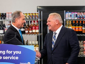 Minister of Finance Peter Bethlenfalvy (left) and Ontario Premier Doug Ford during a press conference at Circle K convenience store in Etobicoke on Thursday December 14, 2023. Premier Ford, and Bethlenfalvy, announced an expansion in alcohol sales in Ontario starting January 1, 2026. (Ernest Doroszuk/Postmedia Network)