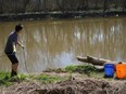 Using a heavy-duty magnet attached to a rope, Dan Juneau pulls metal scraps from local waterways, which he then recycles. YouTube screen grab / Dan Adventure Calls