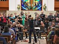 Arcady's chorus and strings perform in concert