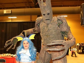 Abby Dickens, 8, of Ridgetown, was sporting a Vaporean costume, which is a Pokémon character, while posing with Groot from the Guardian of the Galaxy on Saturday at the CK Expo. PHOTO Ellwood Shreve/Chatham Daily News