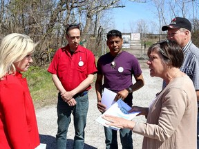Ontario Liberal leader Bonnie Crombie, left, and Cathy Burghardt-Jesson, left, Liberal candidate running in the byelection for the vacant Lambton-Kent Middlesex seat, were updated Friday about concerns over a proposed landfill and regenerative recycling project at a dormant landfill near Dresden by members of Dresden C.A.R.E.D. (Citizens Against Reckless Environmental Dumping). Members of the group who shared the information, include from second left, Thomas Peacock, Stefan Premdas and Doug Shaw. PHOTO Ellwood Shreve/Chatham Daily News