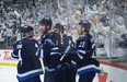 Adam Lowry #17 of the Winnipeg Jets celebrates his second period goal on Alexandar Georgiev #40 of the Colorado Avalanche in Game 1 at Canada Life Centre on Sunday night.