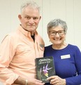 Willy Waterton and Audrey Armstrong, authors and photographer of the updated guide to Orchids: Bruce & Grey, pose with the book following the Huron Fringe Field Naturalists meeting in April. Christine Roberts photo