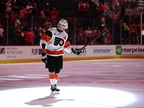 Philadelphia Flyers' Travis Konecny acknowledges fans after he was chosen as star of the game against the New Jersey Devils on Saturday, April 13, 2024, in Philadelphia. (Derik Hamilton/The Associated Press)