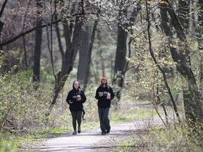 Autumn Zahara and Justyn Hilton enjoy a walk at Ojibway Park in Windsor on Tuesday, April 16, 2024. The Liberal government on Tuesday announced funds in the 2024 federal budget for the creation of an Ojibway National Urban Park.