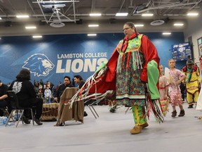 Annie Williams, of Aamjiwnaang First Nation, dances in a powwow for the first time Thursday during the 29th annual Lambton College Powwow.