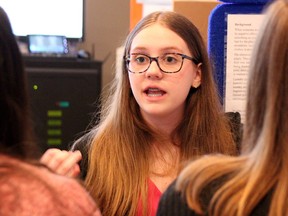 Cynthia Rayson, 13, describes to judges Saturday her Lambton County Science Fair project, Washing Away the Environment: An Environmental Analysis on Laundry Detergent.